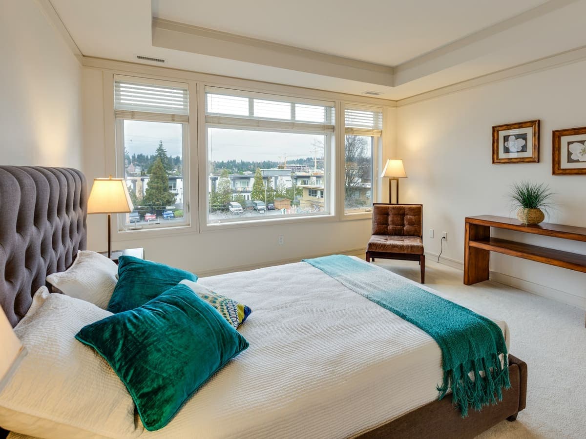 Tidy bedroom with a neatly made bed